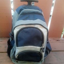 Multi Pocket Rolling Packback With Telescope Handle