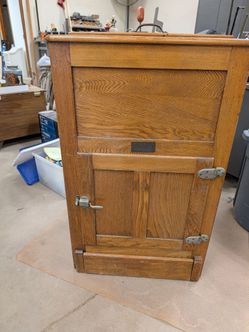 1912 wooden ice box by Grand rapids