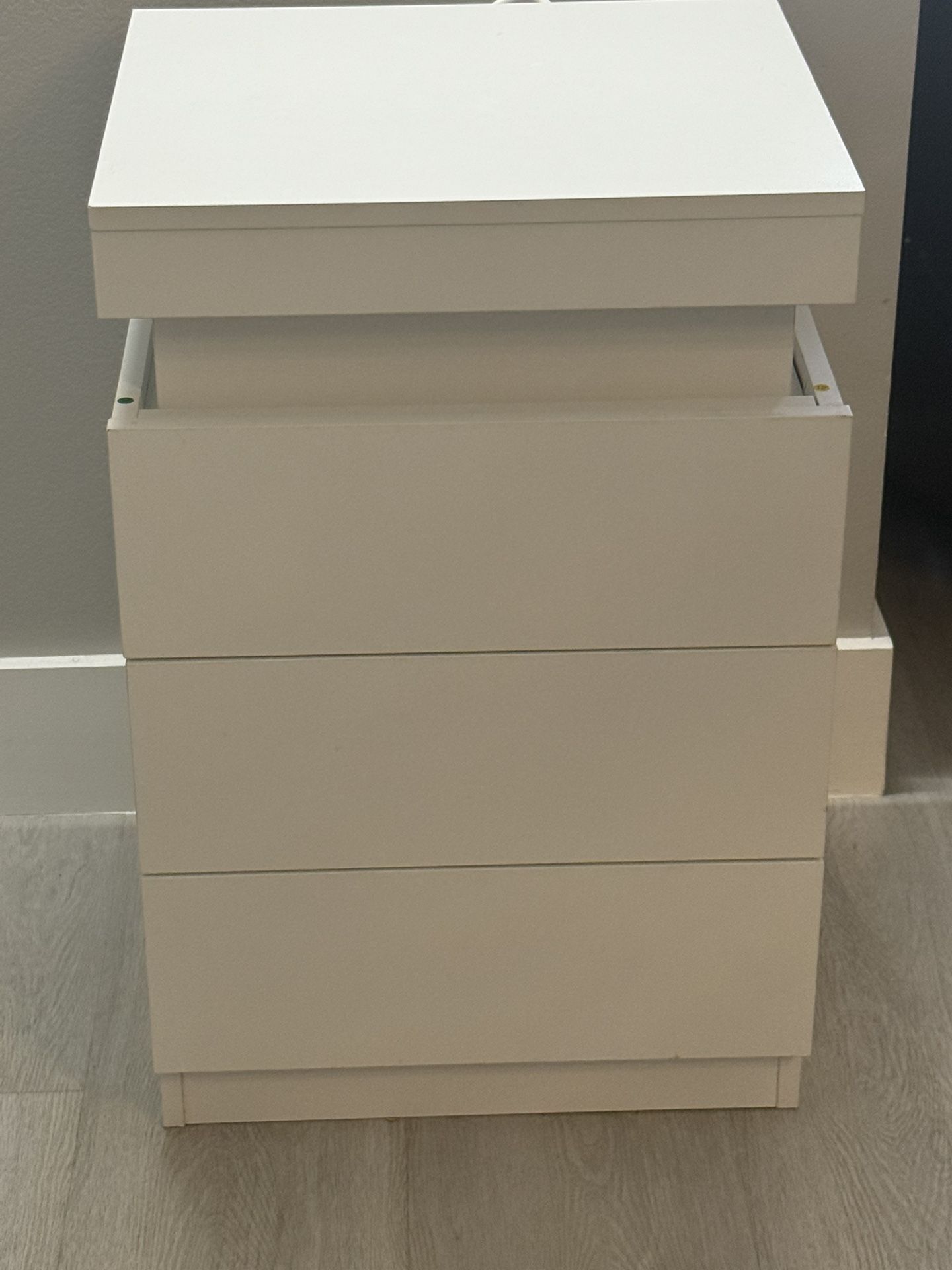 9 Draw Dresser And Two LED Night Stands.