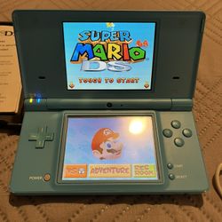 Nintendo DSi Light Blue + Mario And Narnia Game’s (will Trade For Earbuds)