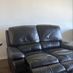Comfy black leather sofa 2 seater