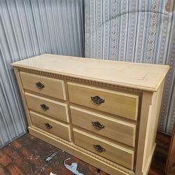 Dresser and chest of drawers with changing table combo