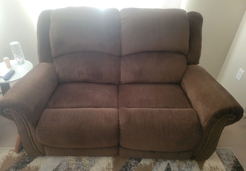 Gently Used Reclining Love Seat