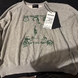 THE DREAM THAT WON'T GO AWAY RAGLAN SWEATSHIRT 