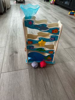 Melissa & Doug Rollables Wooden Ocean Slide Infant and Toddler Toy