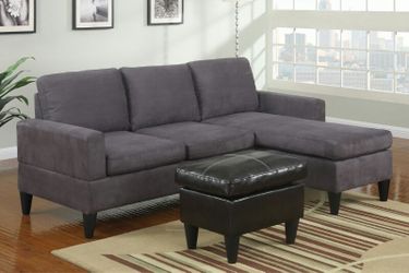 new in box Grey sectional with ottoman