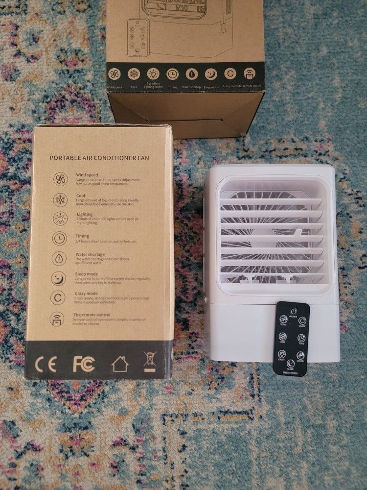 2 Brand NEW Plug In Fans with Water Evap Ability