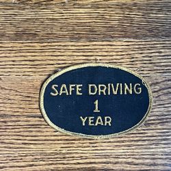 Vintage “Safe Driving 1 Year” Oval Patch Black with Gold letters   