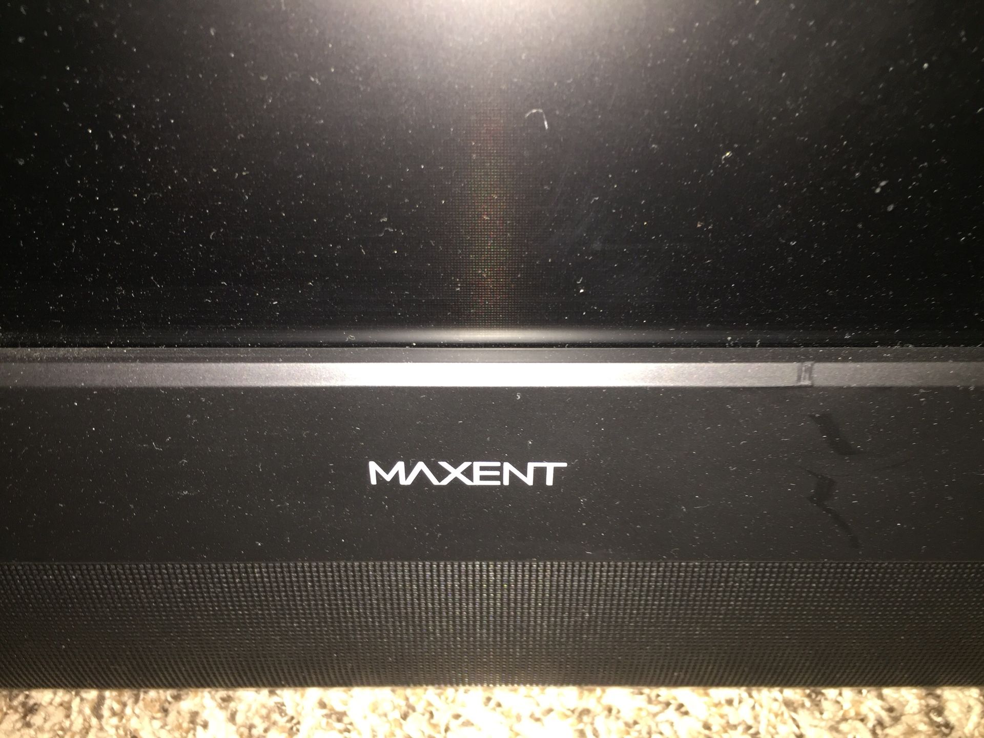 Maxent 32” flat screen TV with built in DVD player.
