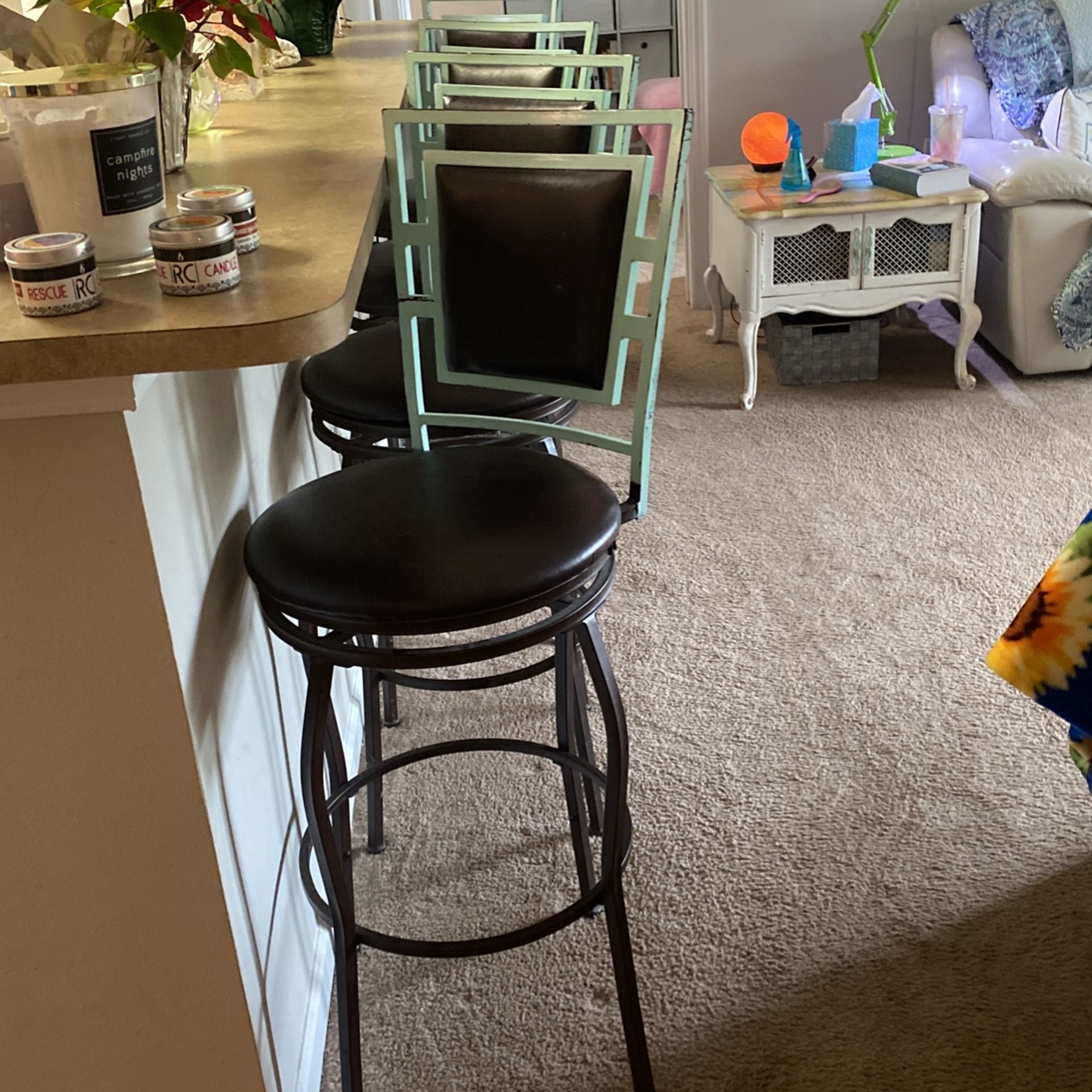 Four Iron Swivel Stools Bar Height