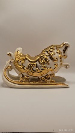 White baroque and Gold Ceramic Sleigh Figurine