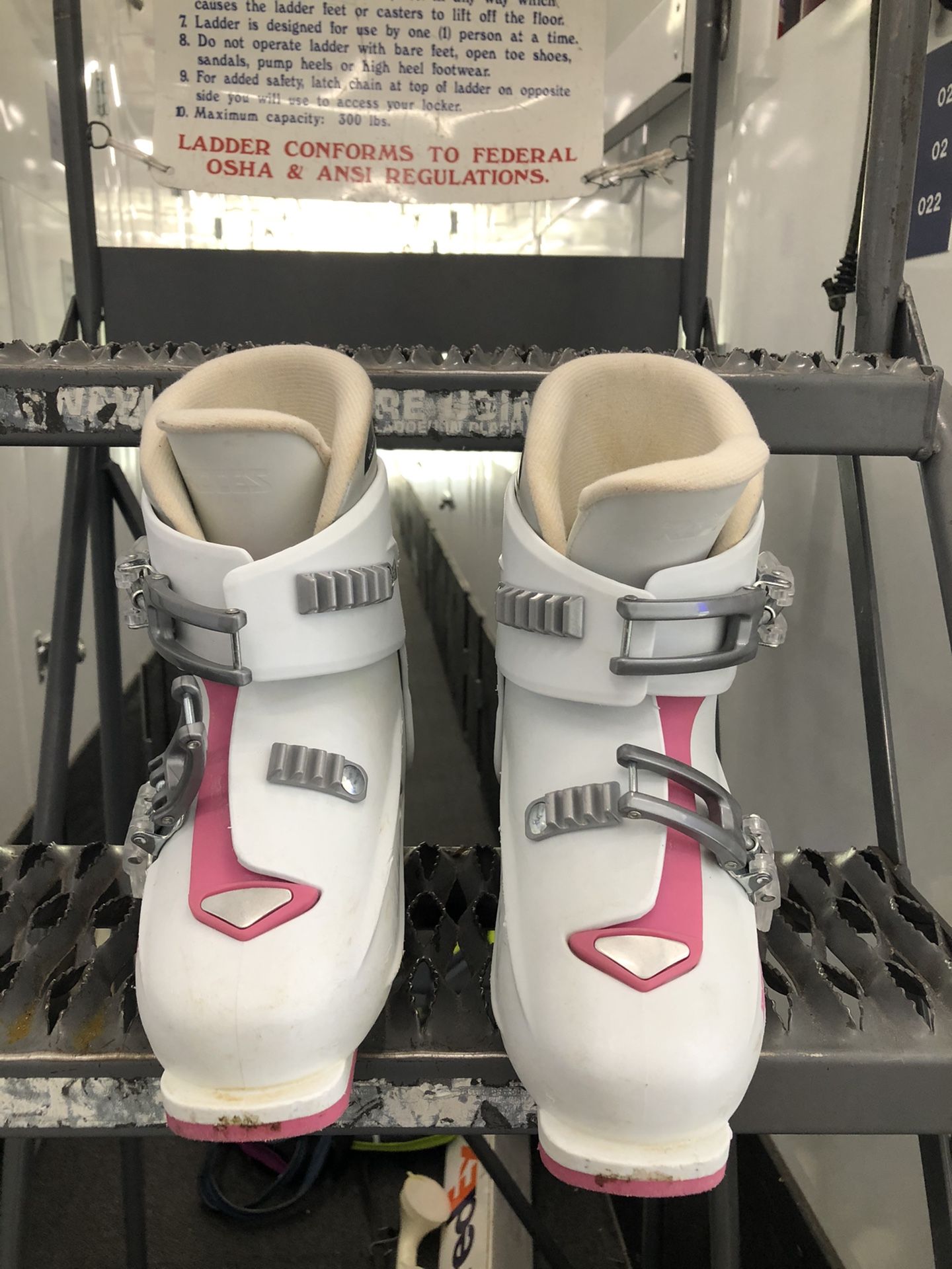 Roces Pink/White Ski Boots and Defiance Cannon Skis