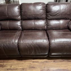 Matching leather couch and loveseat/both power recline