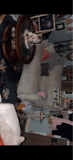 Beige reclining sofa