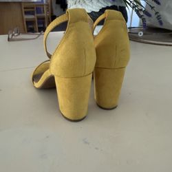 Yellow sued shoes