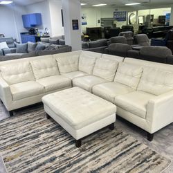 White Pleather Sectional With Ottoman 