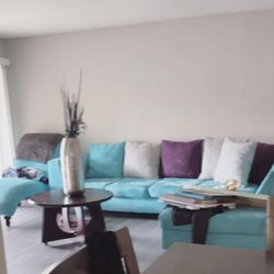 Sectional turquoise blue couch