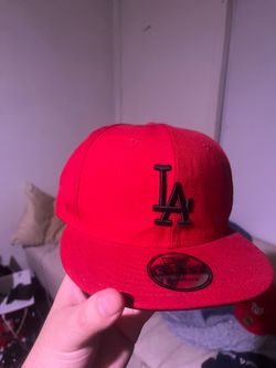 New Era 9FIFTY Snapback cap in a solid, bright red color.