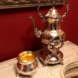 Towle Silverplated Tilting Teapot on stand with Sugar/Water Bowl New in box.  $85 