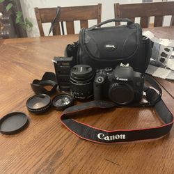 Canon EOS Rebel T7i with lenses and carrier