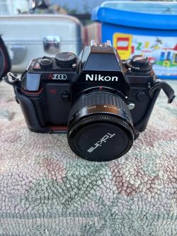 Nikon N2000 35mm Film Camera with Tokina Doubler Lens