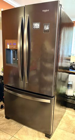 EXCELLENT WHIRLPOOL 25 CU. FT. FRENCH DOOR REFRIGERATOR IN FINGERPRINT RESISTANT BLACK STAINLESS TWO-TIER FREEZER STORAGE