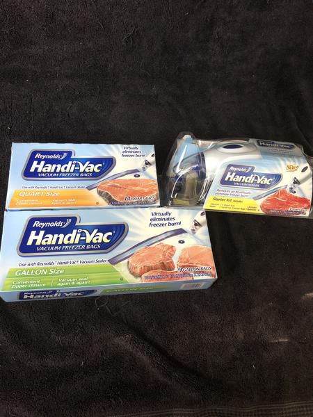 Handy-vac vacuum sealer with quart size and gallon sized bags