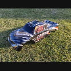 TRAXXAS  STAMPEDE BODY. TRUGGIE, SLASH, ETC. MAY FIT OTHER CARS/TRUCKS. BRAND NEW! ...asking $30.00