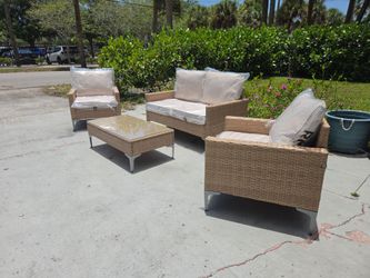 Brand new four-piece wicker outdoor patio set fully assembled