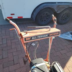 D.R Brush Mower Automatic start, needs battery.