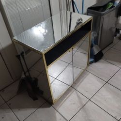 Mirrored Cabinet.