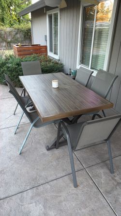 Metal patio table and chairs - great condition