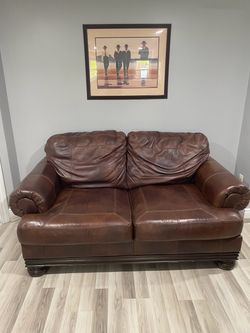 Brown Leather Loveseat with Wood Base