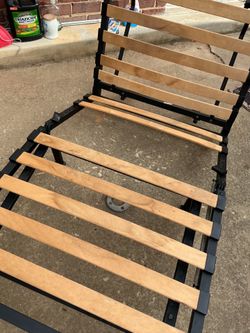 A IKEA single bed (missing 2 wood pieces (needs a little fixing up)