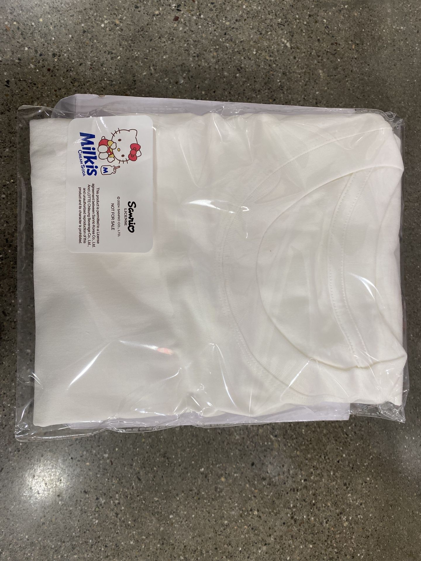 Hello Kitty T-Shirt And Milkis Soda