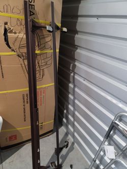 Metal full size bed frame with wheels