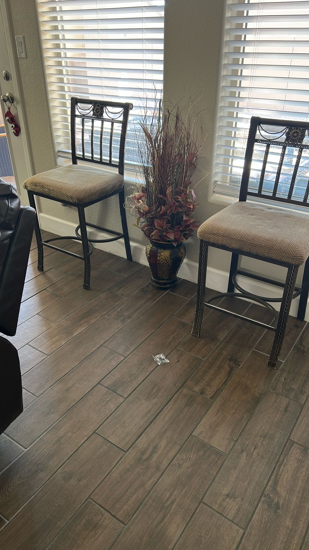 Two High Rod Iron Chairs