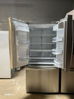 33 inch kenmore Elite refrigerator in good condition with 4 months warranty