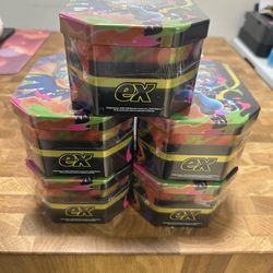 5 Mega Charizard Tins