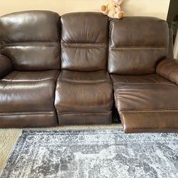 Leather sofa with recliner