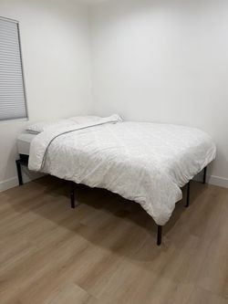 Queen bed- mattress and bed frame