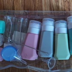 Travel Bottles Contains 4 Bottles,  4 Containers With Lids, Funnel, Stickers..