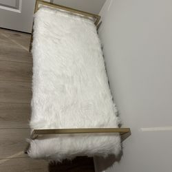 White fur bench gold metal fame