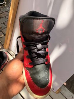 Kids red/black Jordan’s