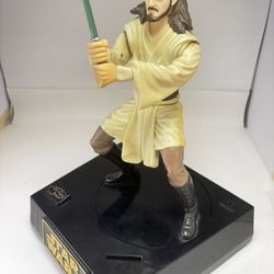 Collectible 1999 Star Wars Action Figure Piggy Bank Qui-Gon Jinn WORKS Damaged