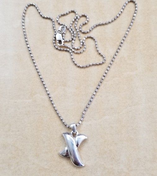Sterling Silver Pendant On A 17 Inch Chain