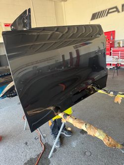 For sale: 2025–2026 Tesla Model Y right front fender in gray.