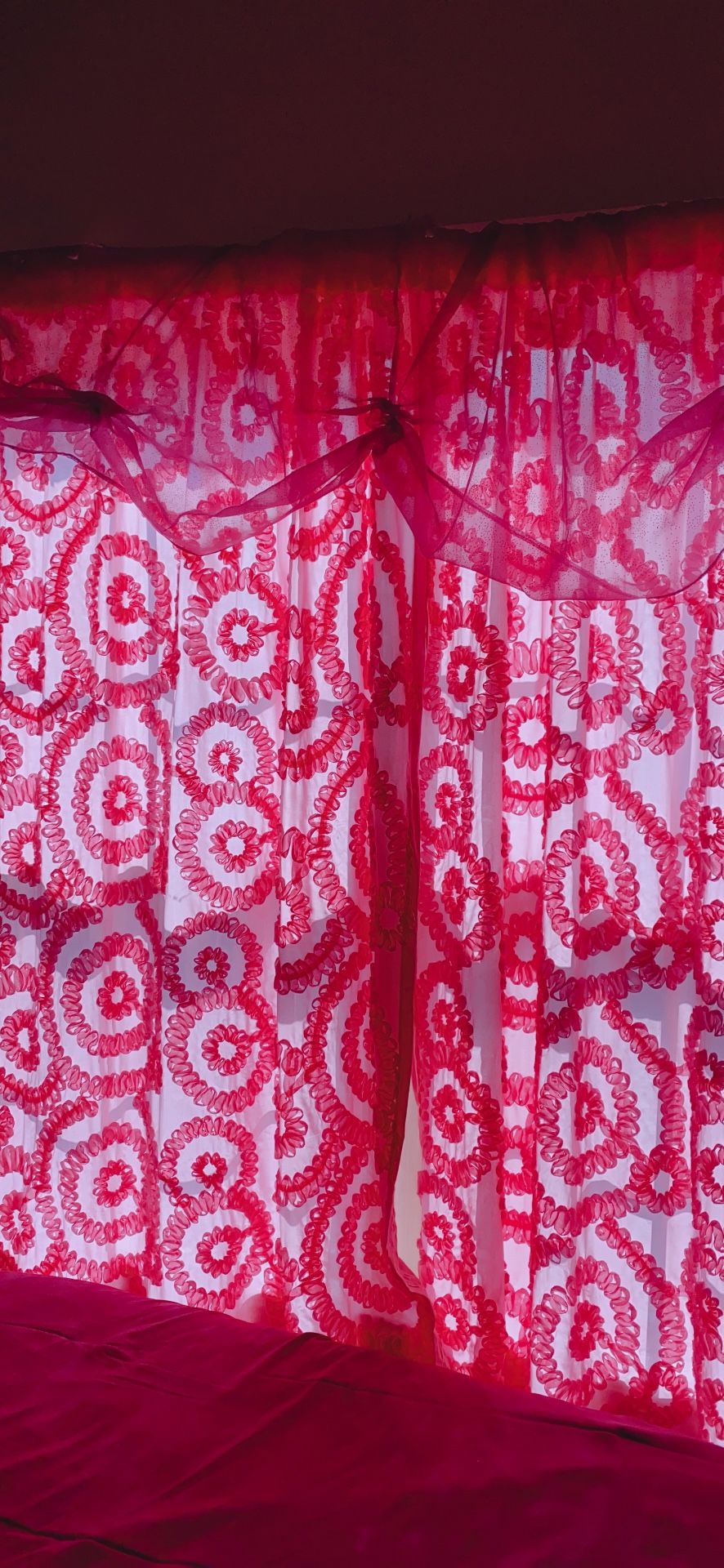 Two pink certain for girls room with valance