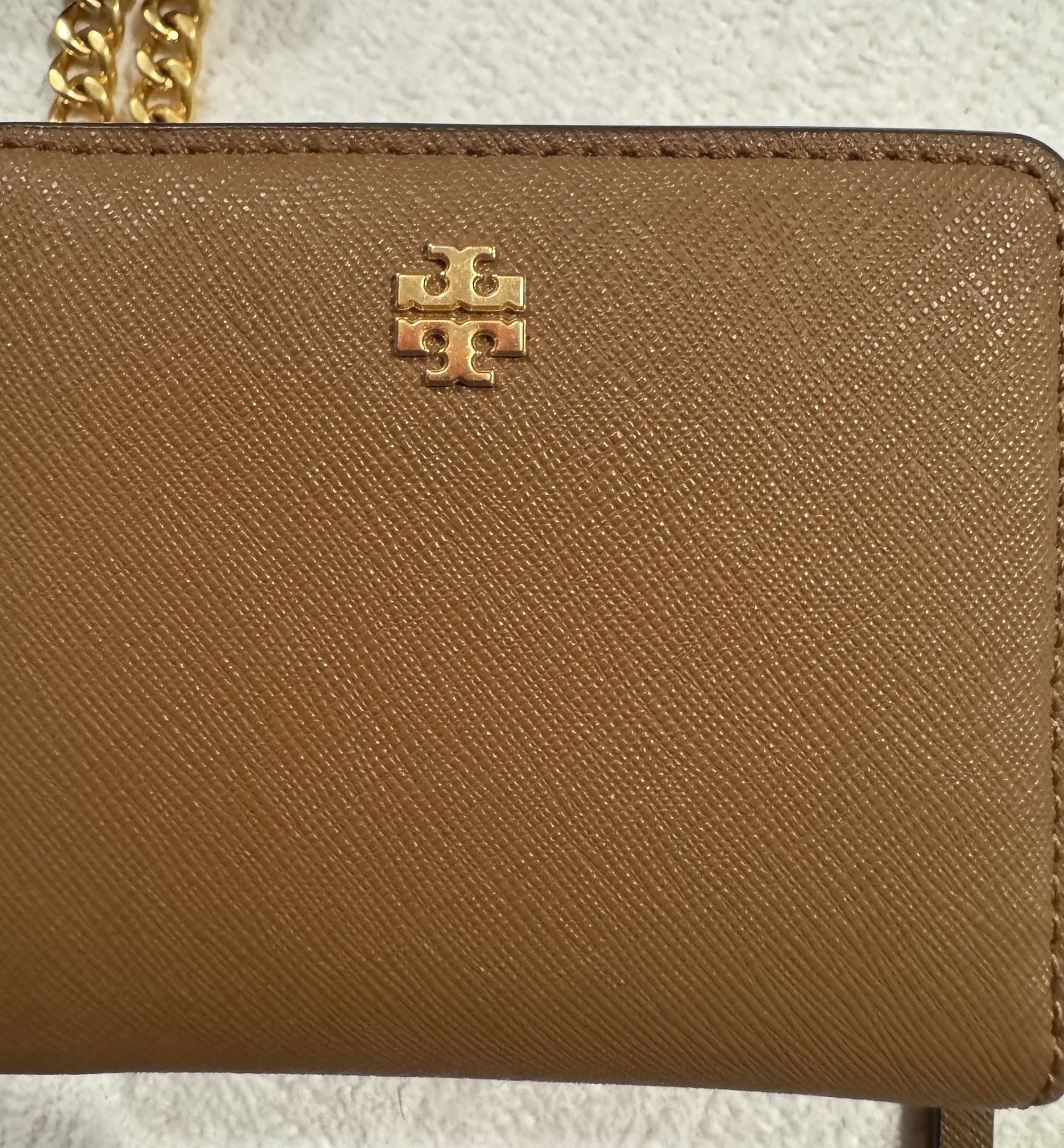 Authentic Tory Burch wallet, if it’s posted it’s available.See map for pick up.Only contact 4 pickup