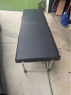 Massage table